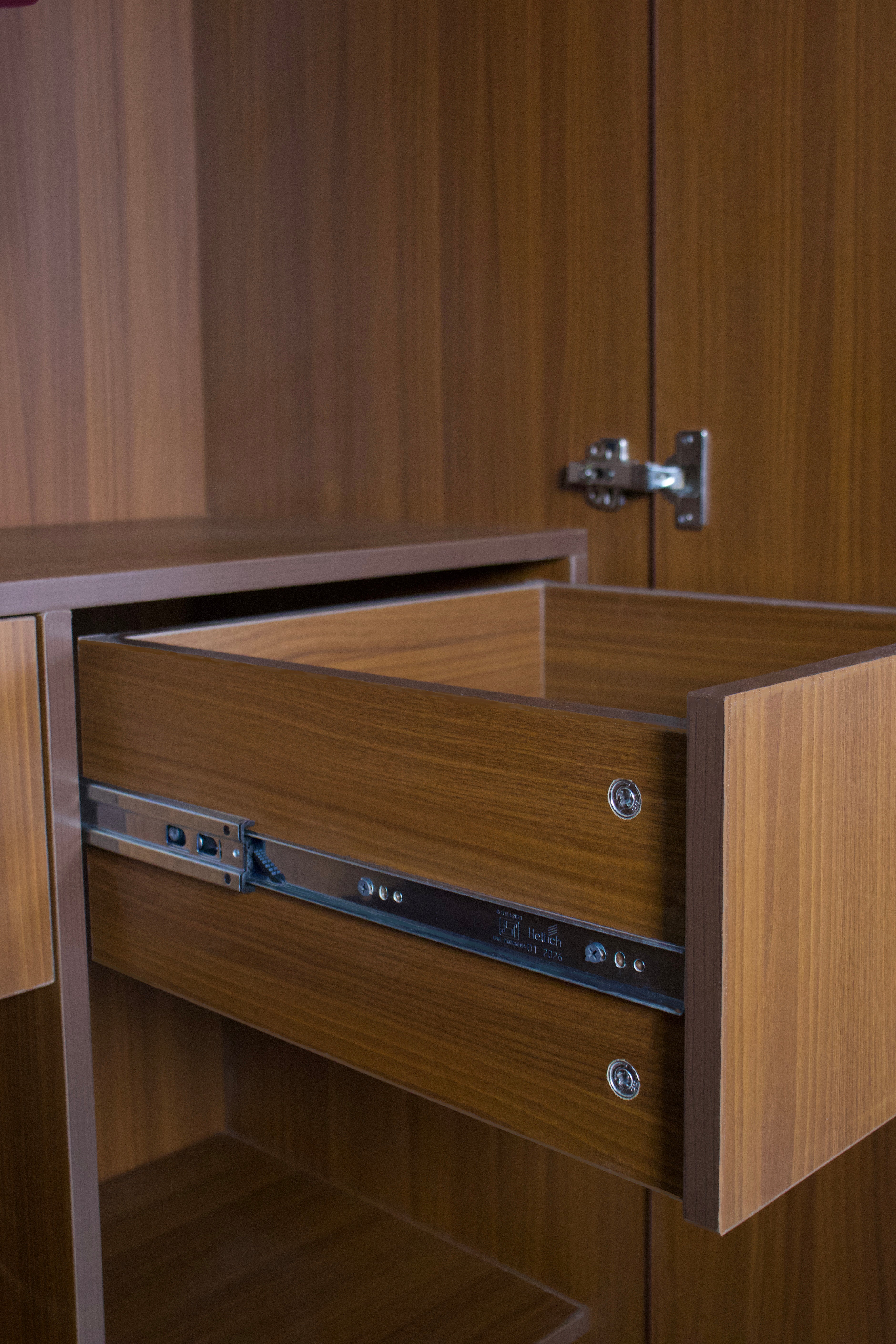 wooden-wardrobe-drawer-slider-closeup
soft-close-drawer-mechanism-wardrobe
wardrobe-drawer-detail-premium-hettich-fittings