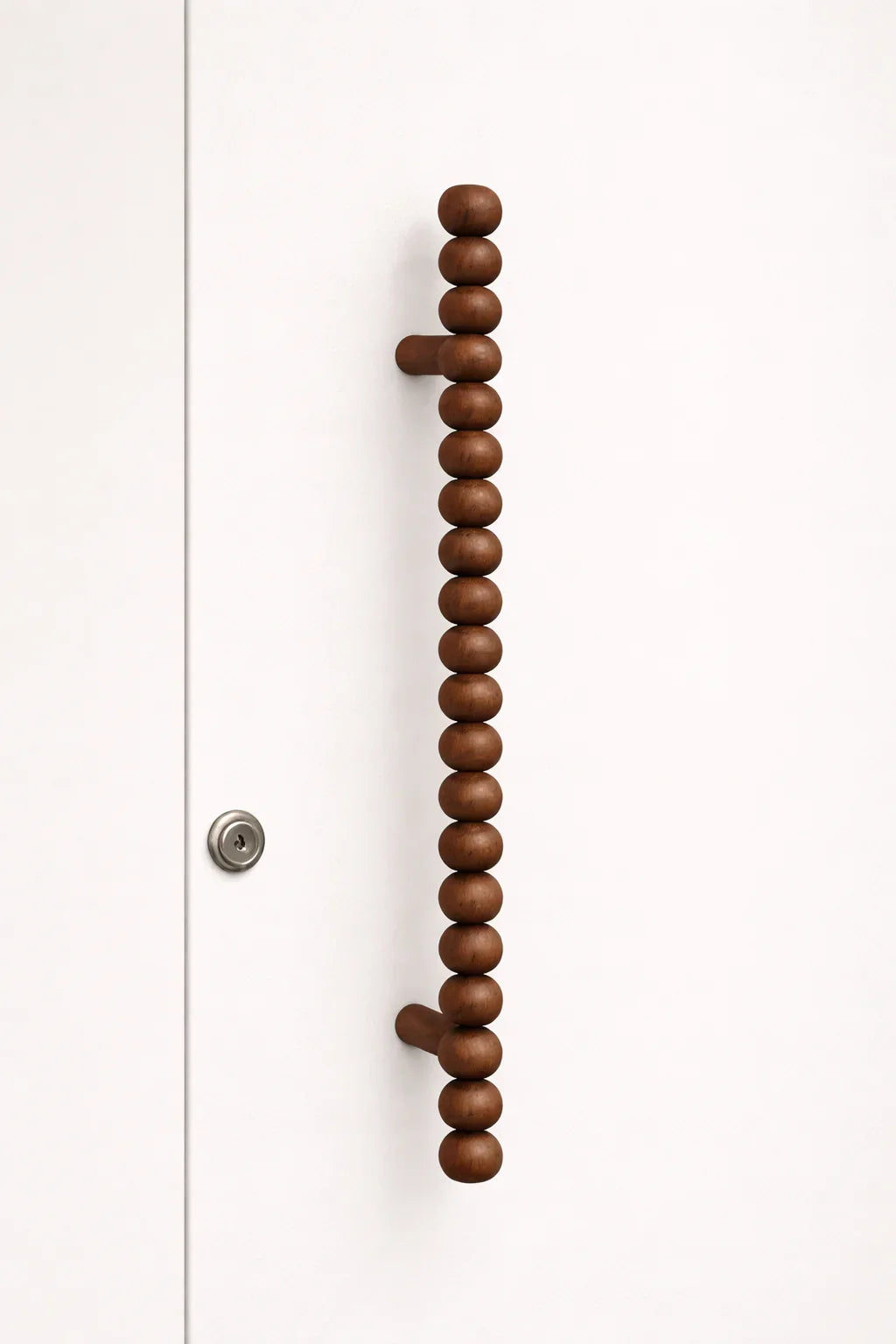 round-bead-wooden-handle-detail-shot
modern-wardrobe-handle-close-up-design
designer-wooden-handle-detail