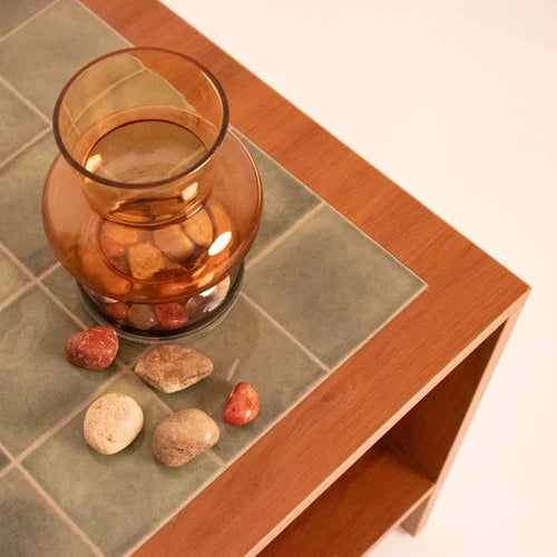 Close-up of tiled top on wooden coffee table by RISA